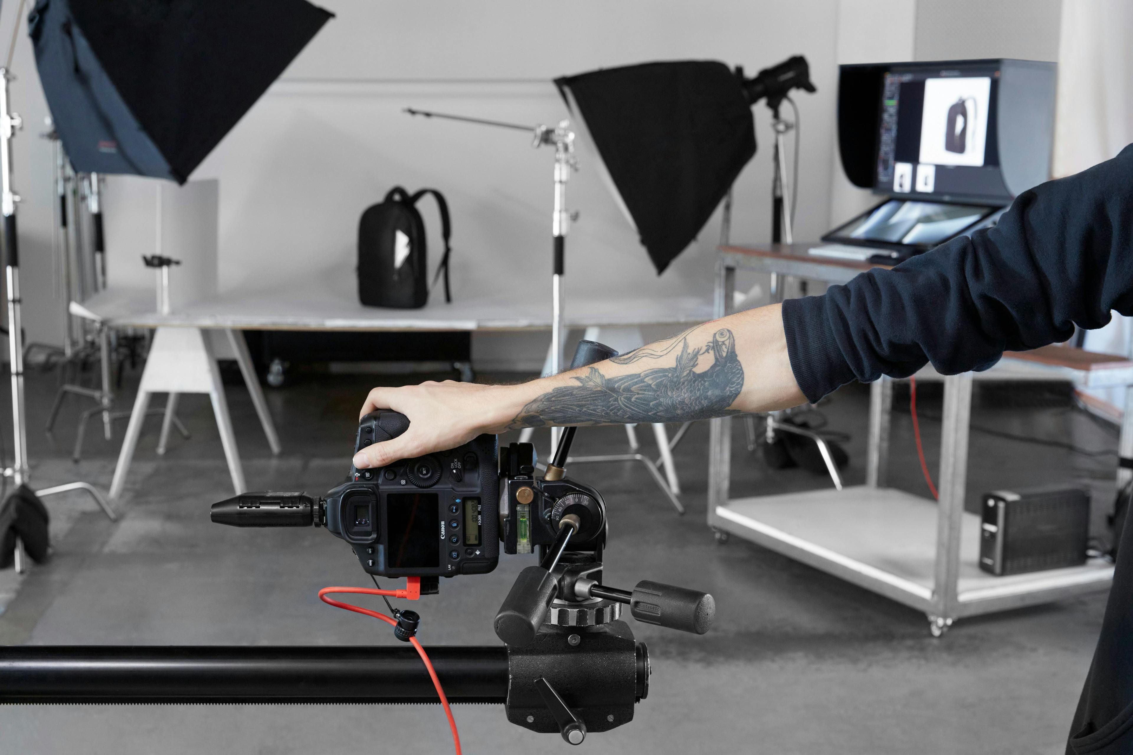 A photography studio with professional lighting and high tech cameras, ready to capture the perfect shot