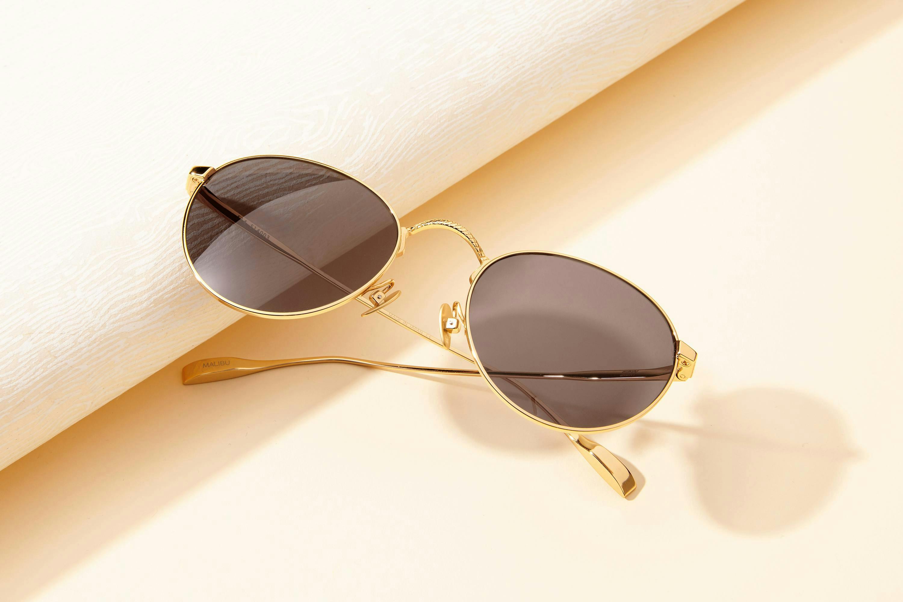 product photography of sunglasses flat lay with shadow 