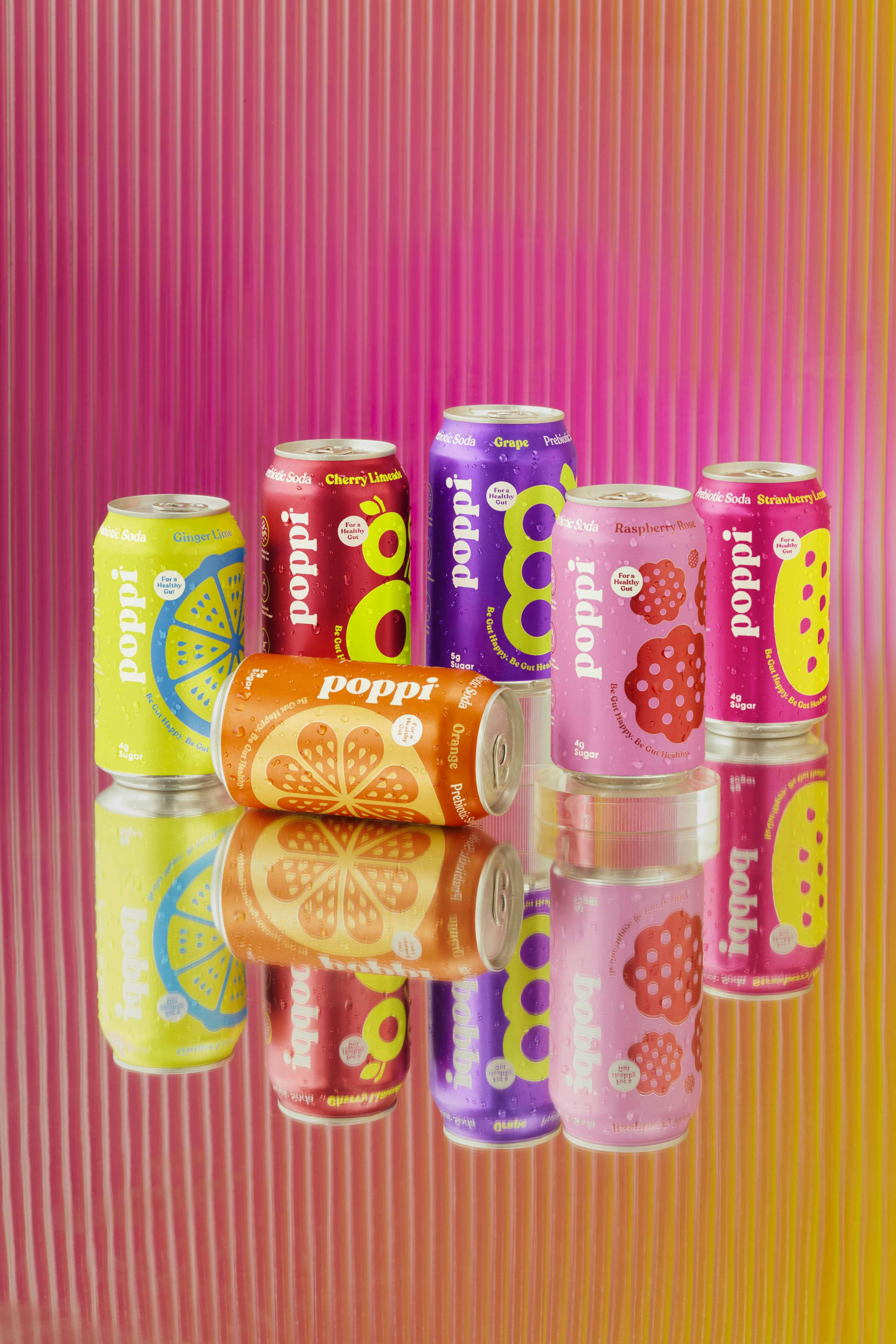 Assorted Poppi products neatly arranged in a group, showcasing a variety of flavors and bottles, ready for a refreshing and healthy beverage experience