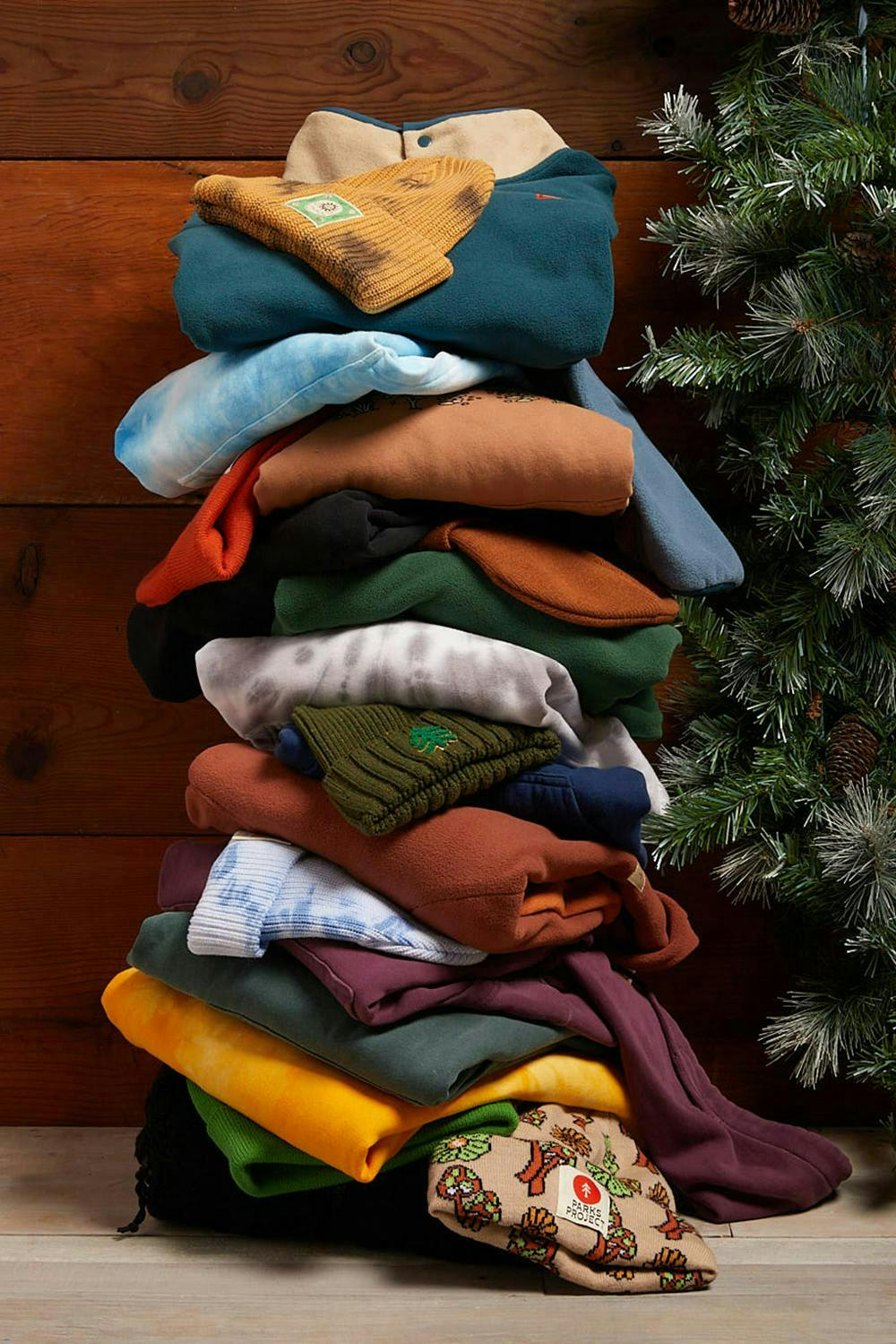 winter apparel stacked for a Christmas fashion photography photoshoot 